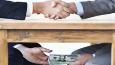 corruption-870×600-1